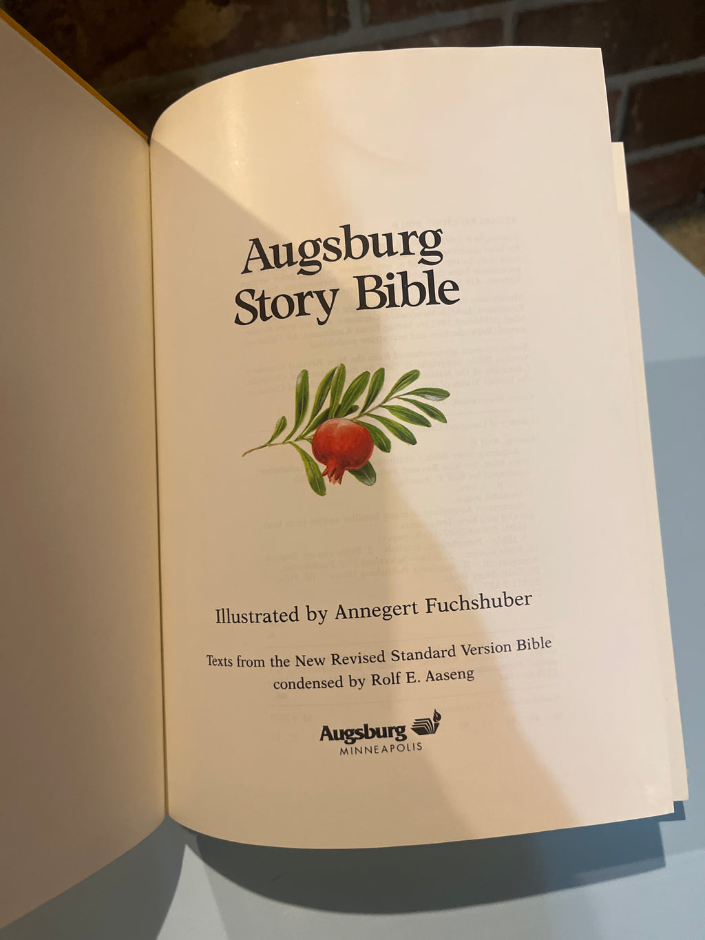 Augsburg Story Bible.  Illustrated by Annegert Fuchshuber