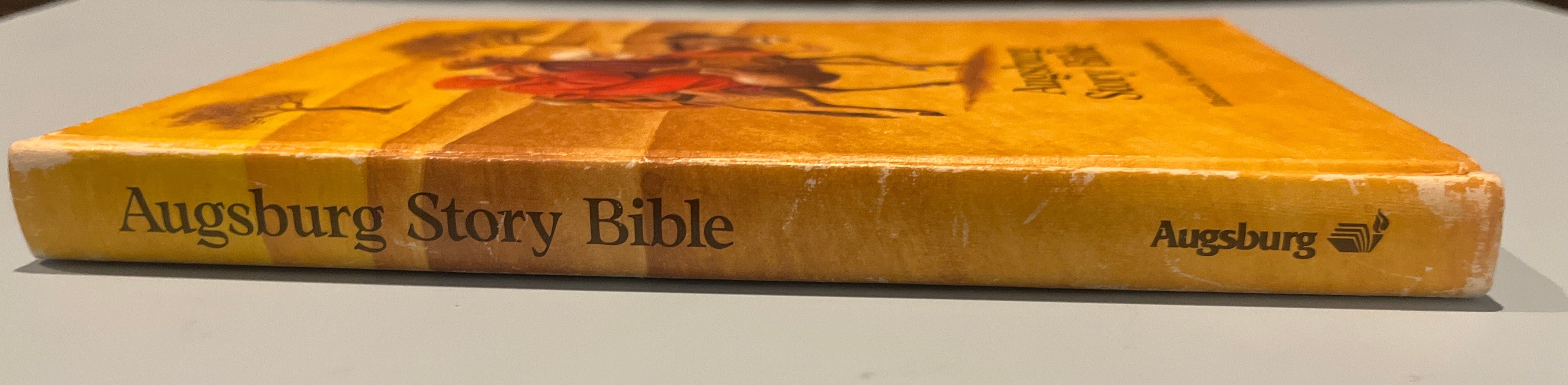 Augsburg Story Bible.  Illustrated by Annegert Fuchshuber